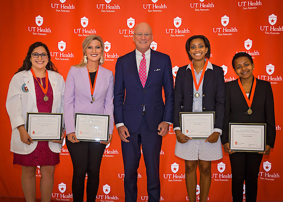 2018ambassadorsdrh (1) From Left: Claudia Tami, Long School of Medicine; Taylor Cook, School of Dentistry; Dr. Henrich; Ariela Wilkins, School of Health Professions; Natasha Bakunda, School of Nursing | Not pictured: Sadiya Ahmad, Graduate School of Biomedical Sciences